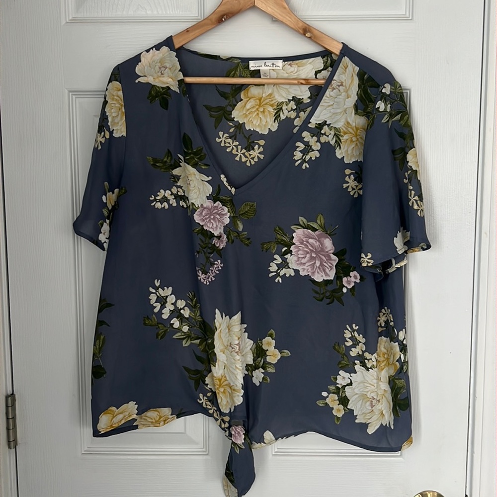 Floral blouse with tie bottom